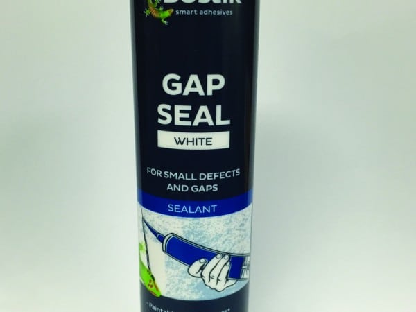 An image of a tube of gap filler silicone on a white background. The tube is labeled with the product brand and specifications. The silicone is in a creamy white color, ready to be used for filling gaps and cracks. The text on the label indicates its purpose and quality. This versatile and durable product is essential for sealing joints, providing a smooth finish, and preventing moisture and air leaks. It is commonly used in construction and DIY projects to achieve a professional and long-lasting result.