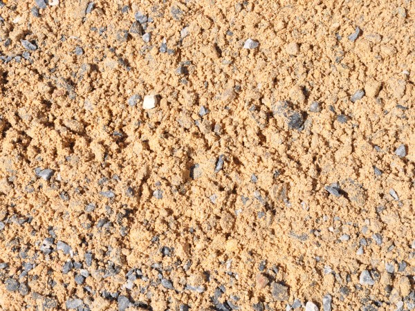 A webpage showcasing an assortment of sand, gravel mix, and concrete mix products from Parklea Sand & Soil. The image displays neatly stacked bags and piles of different aggregates, ranging in size, color, and texture. The products are vital for construction and landscaping projects, providing the foundation for solid structures and decorative elements.