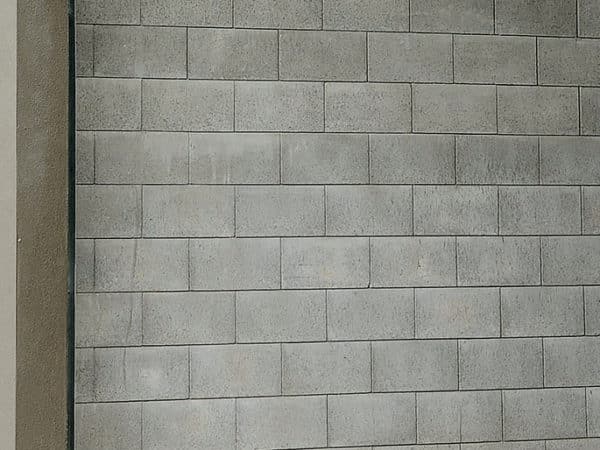Parklea Sand and Soil - Mortarless Grey Lock Block: Lock Blocks can be reinforced to engineers’ specifications as required and comply fully with the Building Code of Australia requirements. They can be used anywhere that conventional masonry is used, subject to usual engineering standards.
