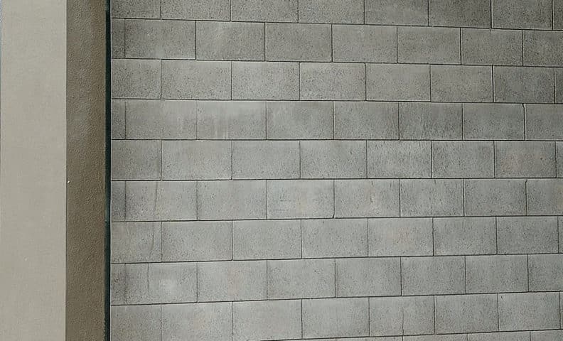 Parklea Sand and Soil - Mortarless Grey Lock Block: Lock Blocks can be reinforced to engineers’ specifications as required and comply fully with the Building Code of Australia requirements. They can be used anywhere that conventional masonry is used, subject to usual engineering standards.