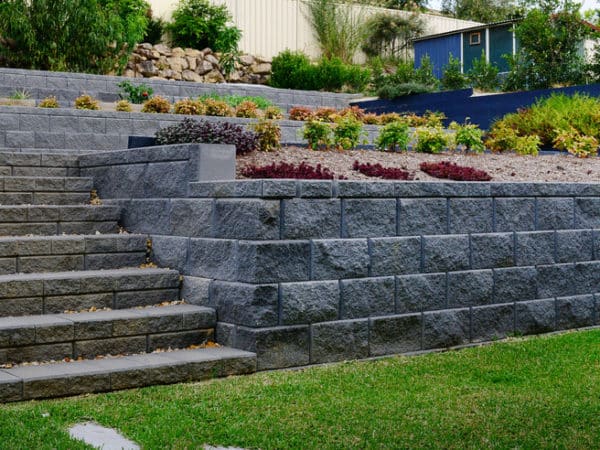 Hastings Blocks are a mortar-less block system designed to create a natural aesthetic. The four natural hues of Charcoal, Alpine, Sepia and Beach, lend a realistic and appealing finish to each block. These structurally sound blocks are perfect for any ‘do it yourself’ project. They can be used to design straight walls, curves, corners and stairs. When engineered these walls can be built up to 3 metres in height. Supplies at Parklea Sand and Soil Australia.