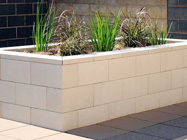 VersaSmooth Blocks - Premium Landscaping Solution for a Stunning Outdoor Transformation. Available in Charcoal, Oatmeal, Ivory, and Steel. Available in Block, Cap, and Corner Block.
