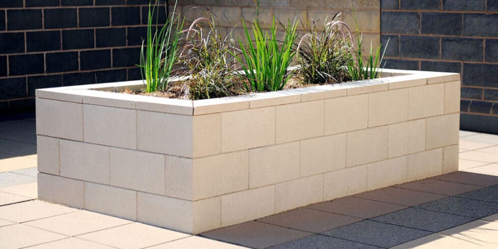 VersaSmooth Blocks - Premium Landscaping Solution for a Stunning Outdoor Transformation. Available in Charcoal, Oatmeal, Ivory, and Steel. Available in Block, Cap, and Corner Block.